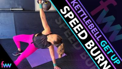 Kindal halfway through the kettlebell get up getting ready to bring her foot back so she can get up to kneeling.