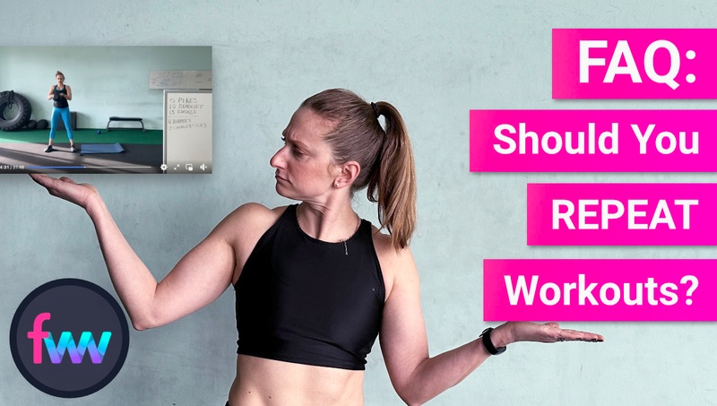 Kindal holding a workout from FWW LIVE and looking at it wondering if she should repeat the workout tor not.