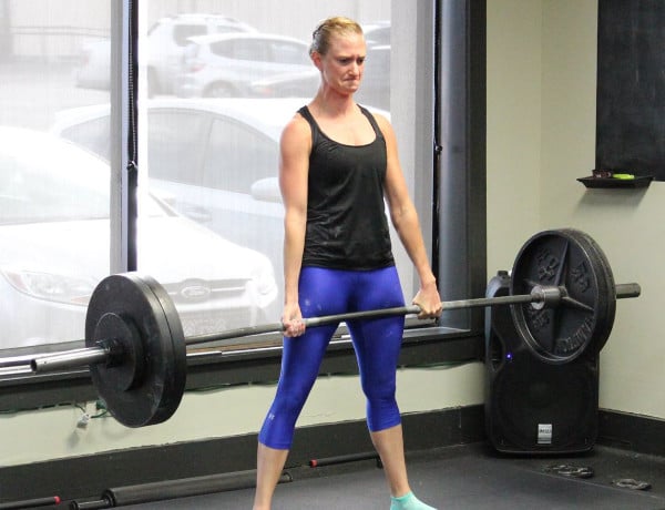 Kindal smiling before teaching a strength training session.